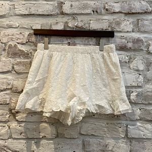 Super down white ruffle shorts